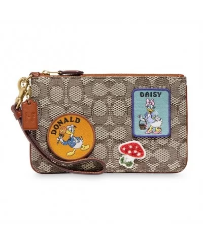 Donald and Daisy Duck Wristlet by COACH $63.00 ADULTS